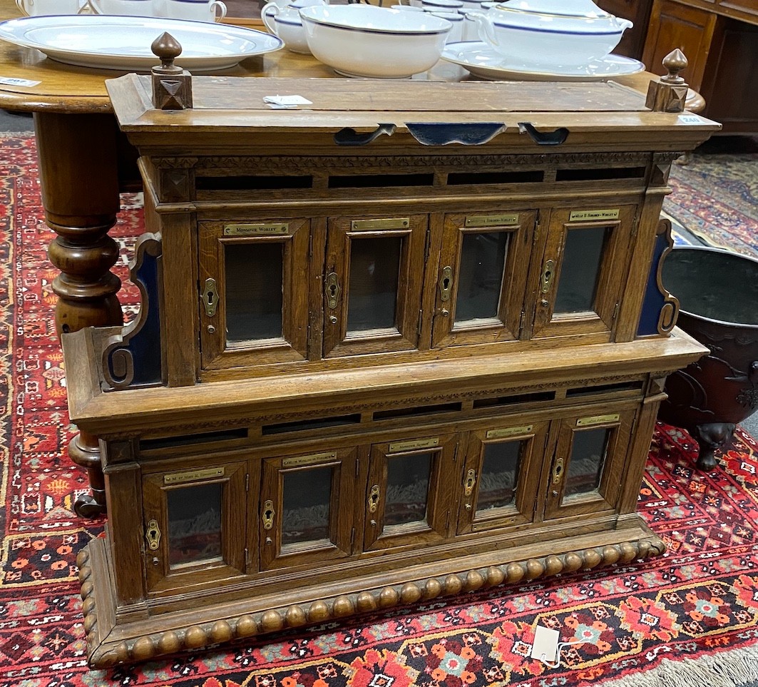 A 19th century French oak nine door post cabinet, width 91cm, depth 23cm, height 85cm